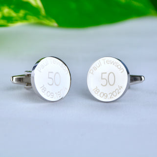 Personalised milestone 50th birthday cufflinks with "Paul Tewson" engraved around the top and "18.09.1974/18.09.2024" engraved around the bottom 