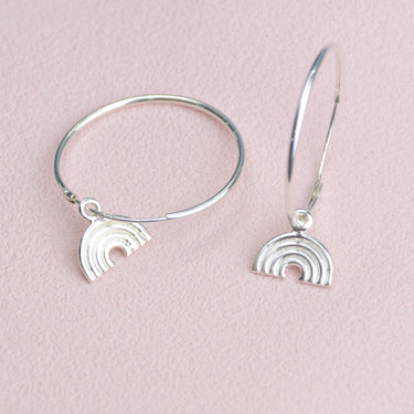 Sterling Silver Hoop Earrings with charm of your choice showing a hoop with rainbow close up .