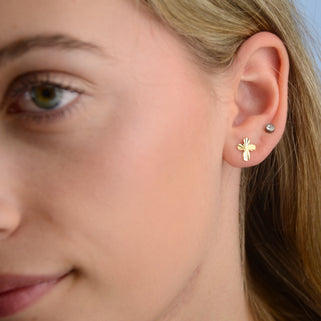 Gold plated Faceted Cross Stud Earrings shown on model