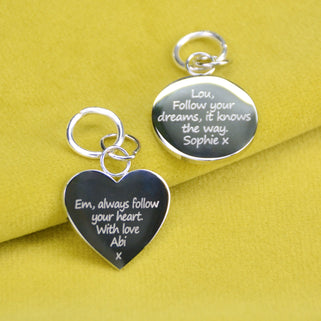 Silver circle and heart bag charms which can be engraved