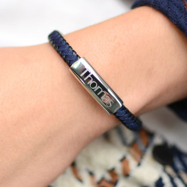 Personalised Men's Leather And Cotton Sliding Bar Bracelet shown close up on model