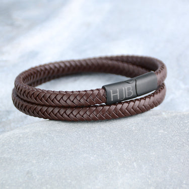 Personalised Men's Recycled Leather Double Wrap Bracelet in brown shown close up with engraving on clasp