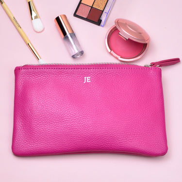 Personalised Monogram Small Leather Cosmetics Bag shown close up in fuchsia