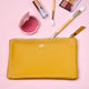 Personalised Monogram Small Leather Cosmetics Bag shown close up in mustard