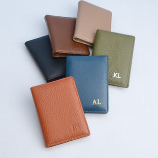 All colour choice of Men's leather card holder being tan, blue, black, olive brown and taupe