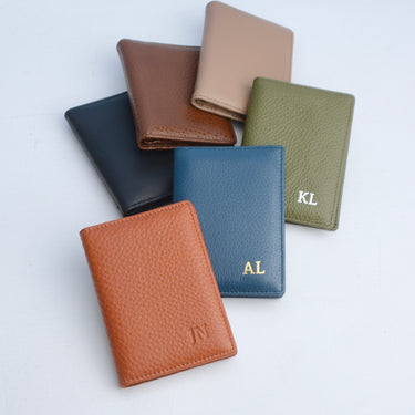 All colour choice of Men's leather card holder being tan, blue, black, olive brown and taupe