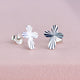 Sterling Silver Faceted Cross Stud Earrings shown close up