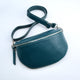 Teal Monogram Leather Half Moon Chest Bag shown close up