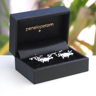 Silver pig cufflinks shown in black Penelopetom cufflinks box