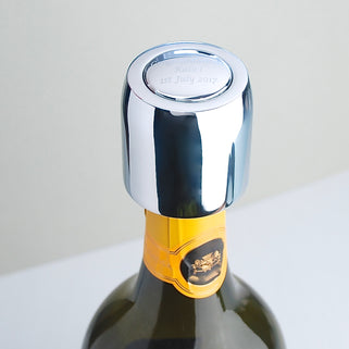 Prosecco Champagne Bottle Stopper with personalised message engraved, shown on champagne bottle.