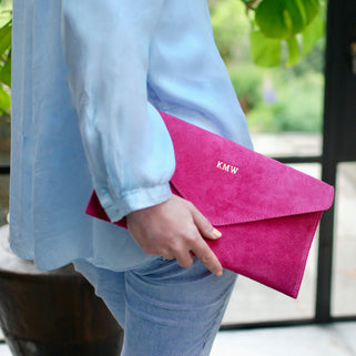 Blush suede clutch online bag